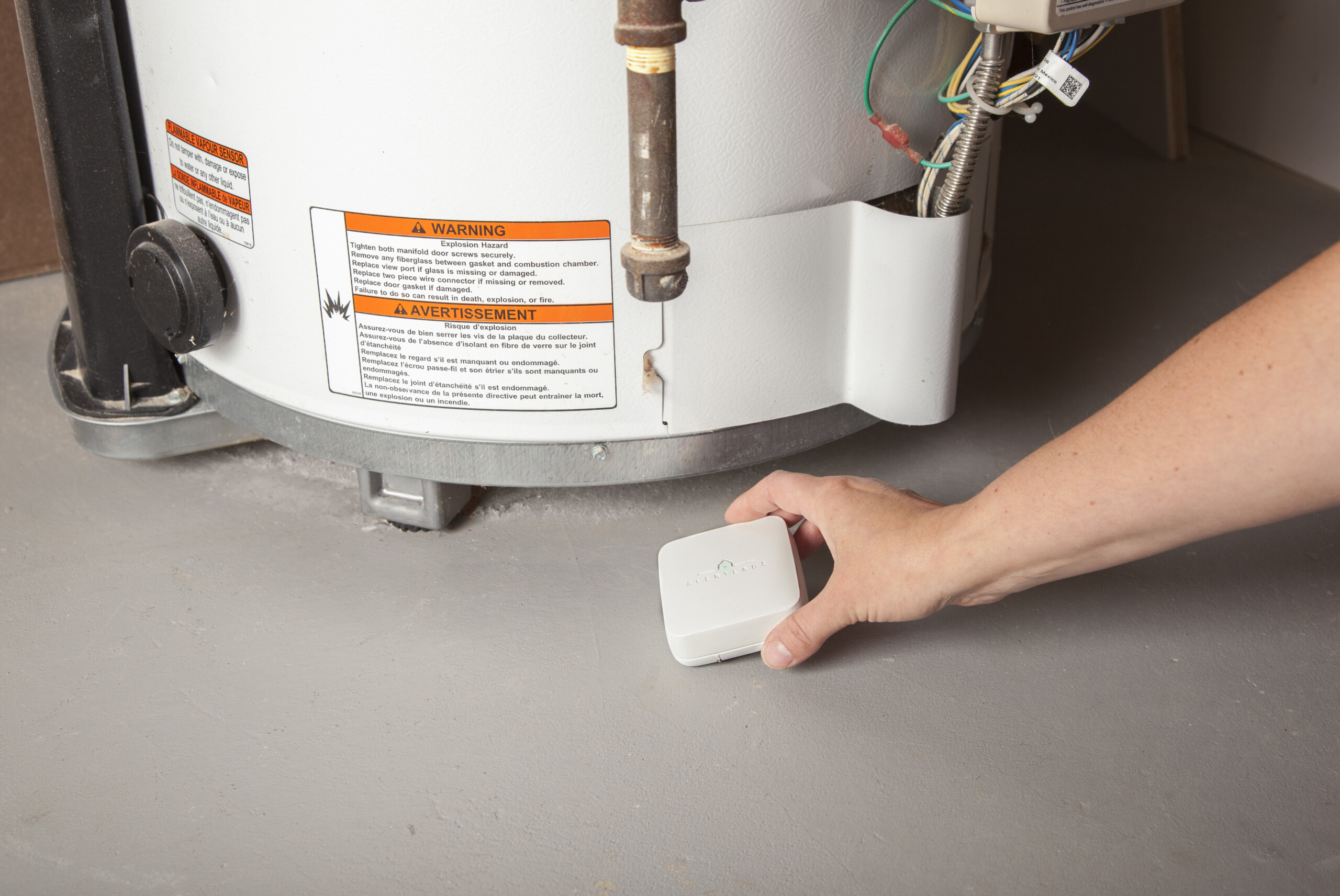 Installing a water monitoring sensor next to a water heater
